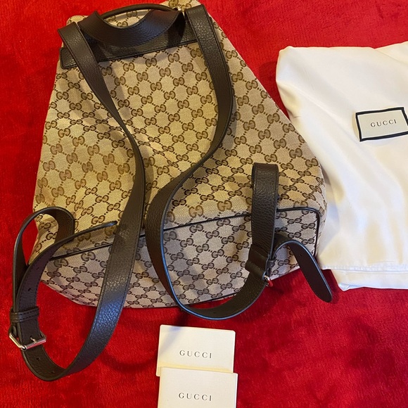 Gucci Brown Monogram GG Canvas Drawstring Backpack Silver Hardware